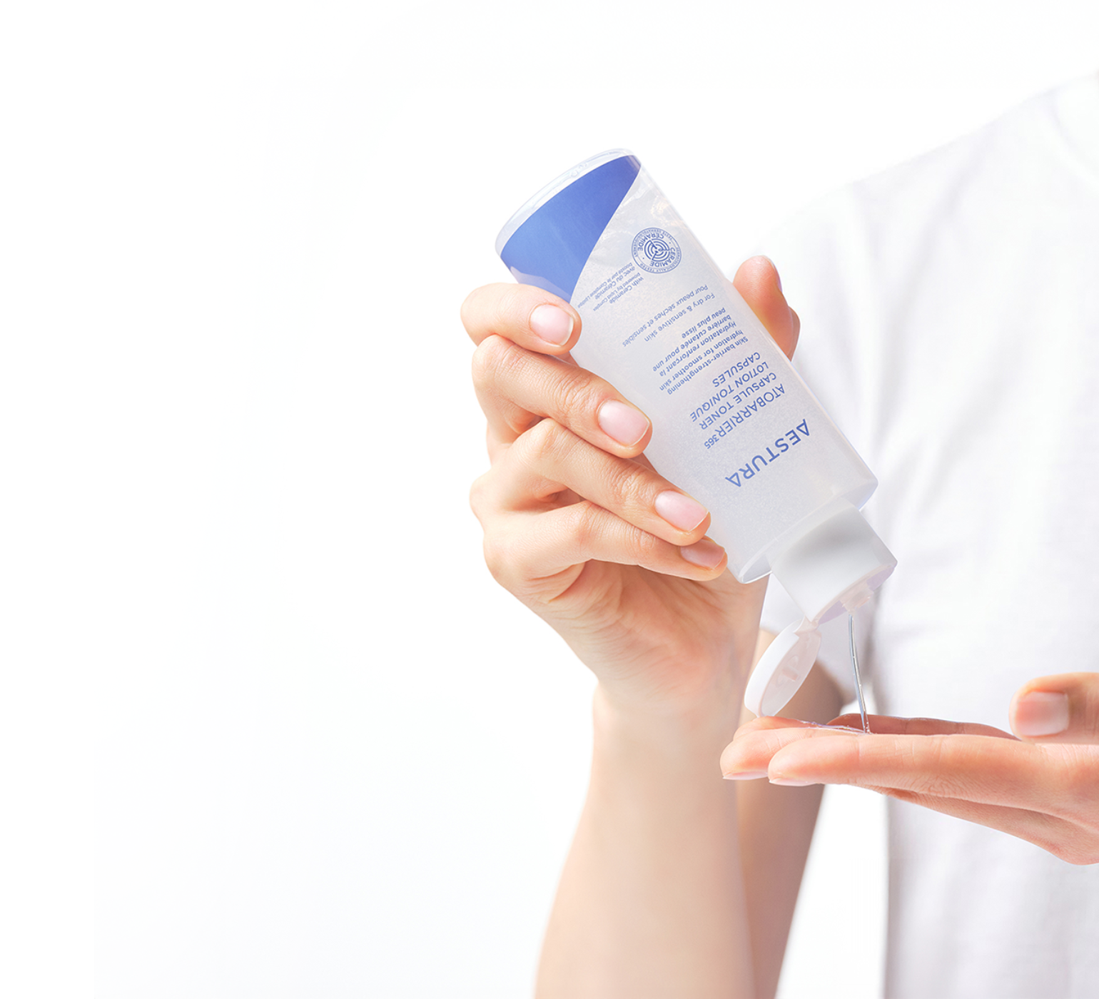 applying Aestura ATOBARRIER365 CREAM onto hand for skincare routine