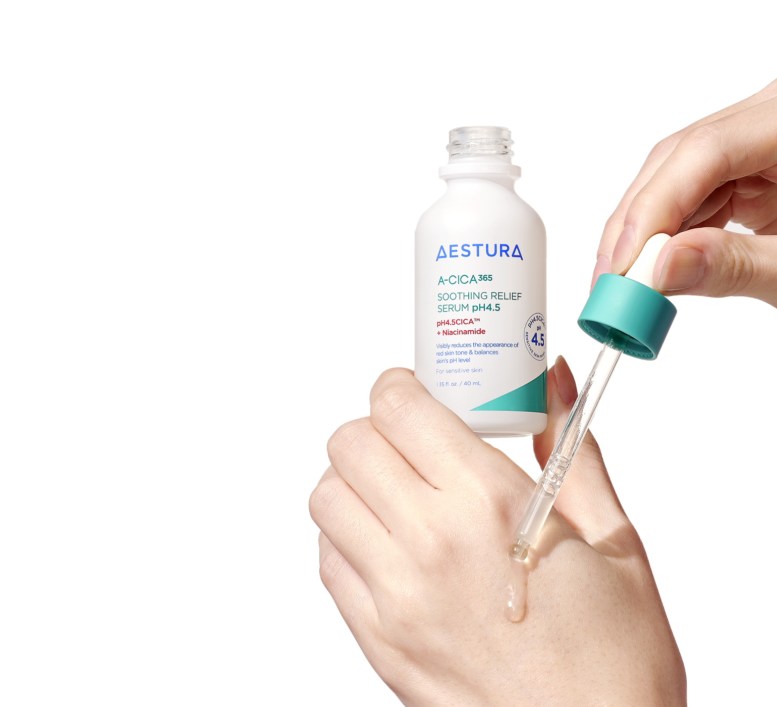 Dropper applying Aestura serum onto hand for skincare routine	