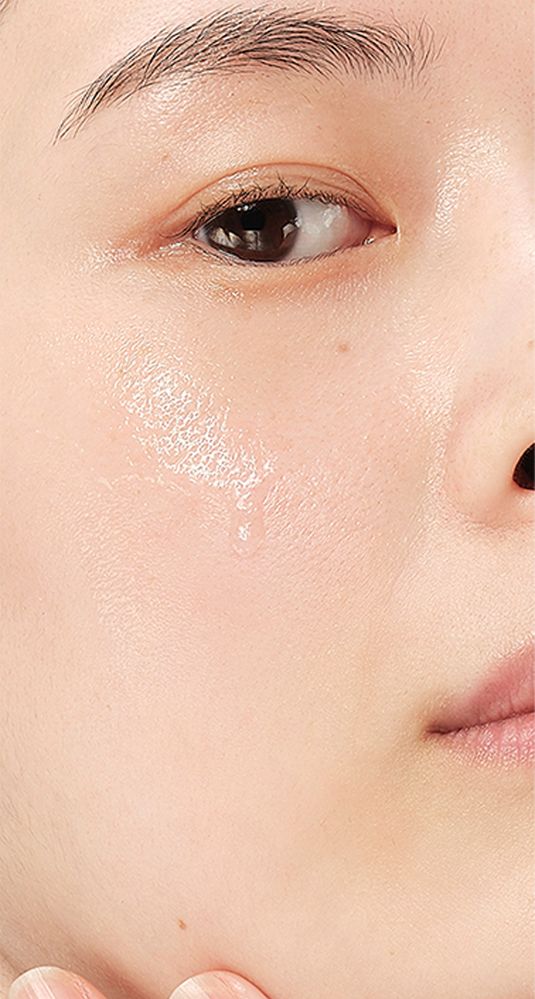 Close-up of Aestura cream being applied on the face