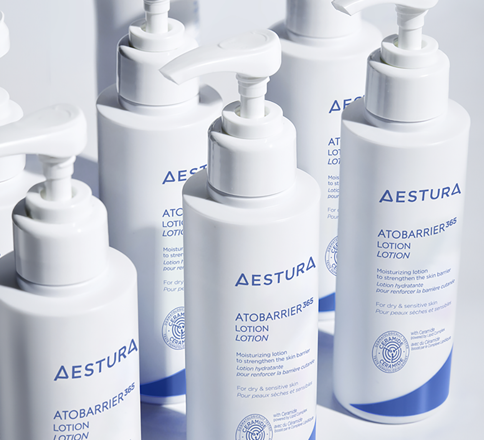 Multiple Aestura lotion bottles display
