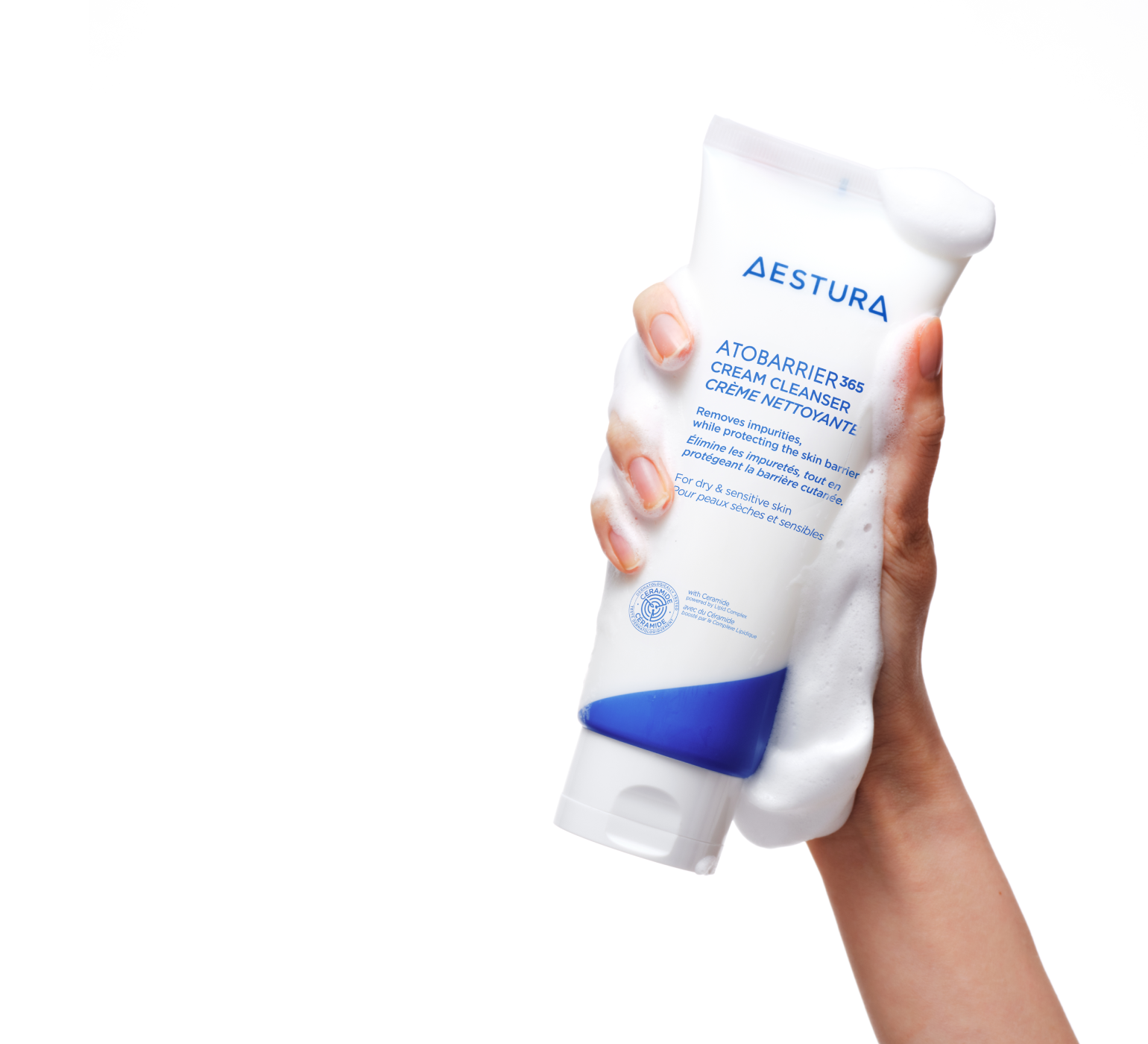 applying Aestura ATOBARRIER365 CREAM onto hand for skincare routine	