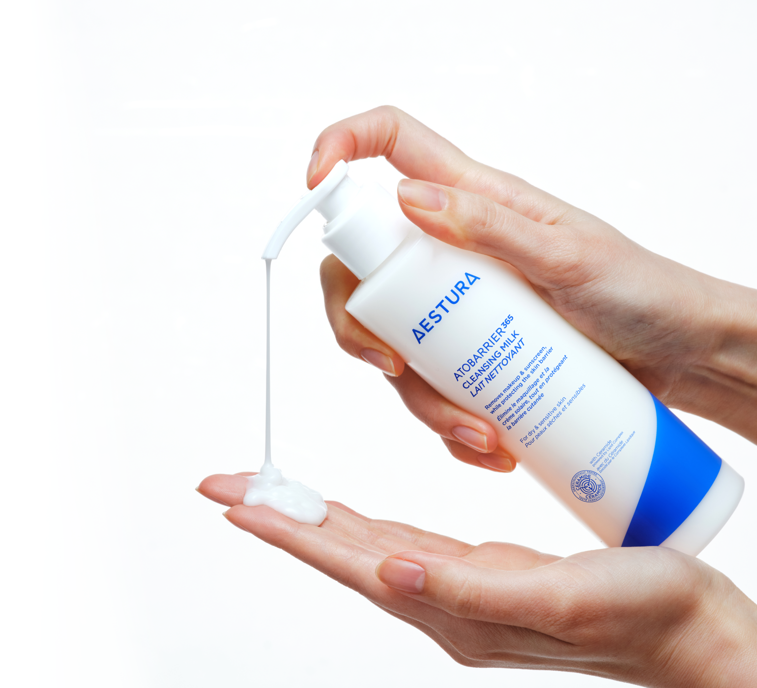 applying Aestura ATOBARRIER365 cleanser onto hand for skincare routine