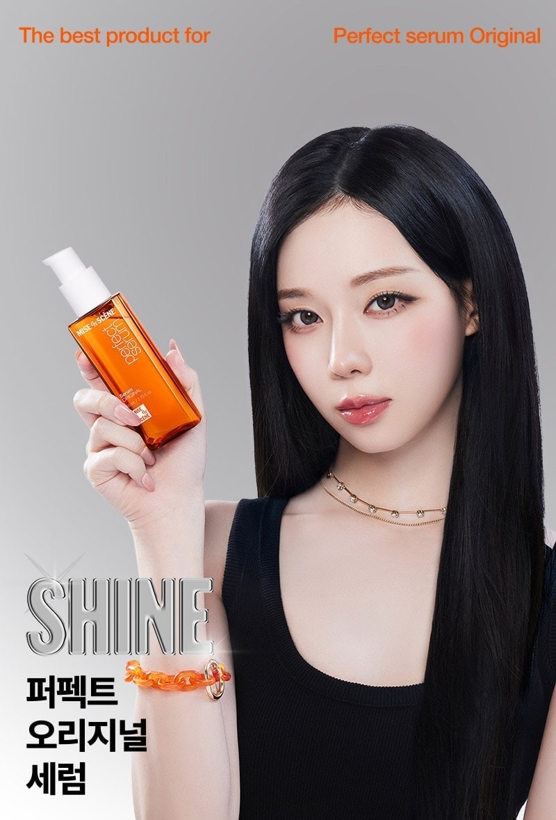 Official portrait of a model holding the original serum.