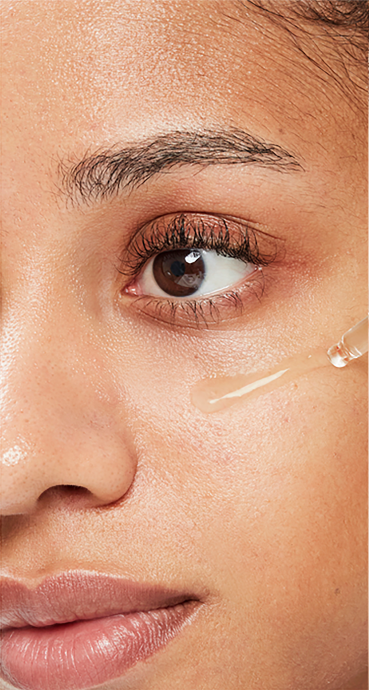 Close-up of face with Aestura essence applied